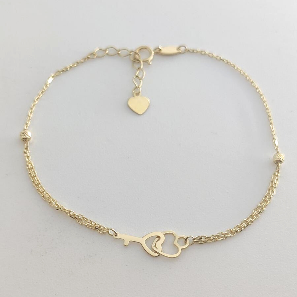 __ext__/PULSERA ORO 18KL LLAVE + CORAZON
