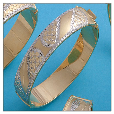BRAZALETE BICOLOR TALLADO ORO 18KL